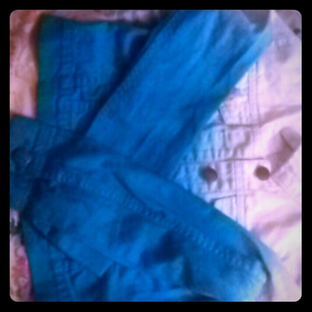 A long sleeve blue and white jacket